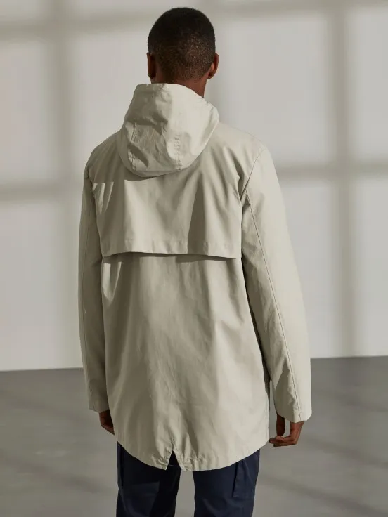 Man's parka in technical fabric with hood and pockets