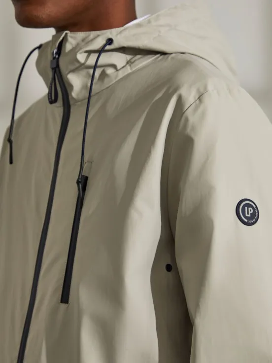 Man's parka in technical fabric with hood and pockets