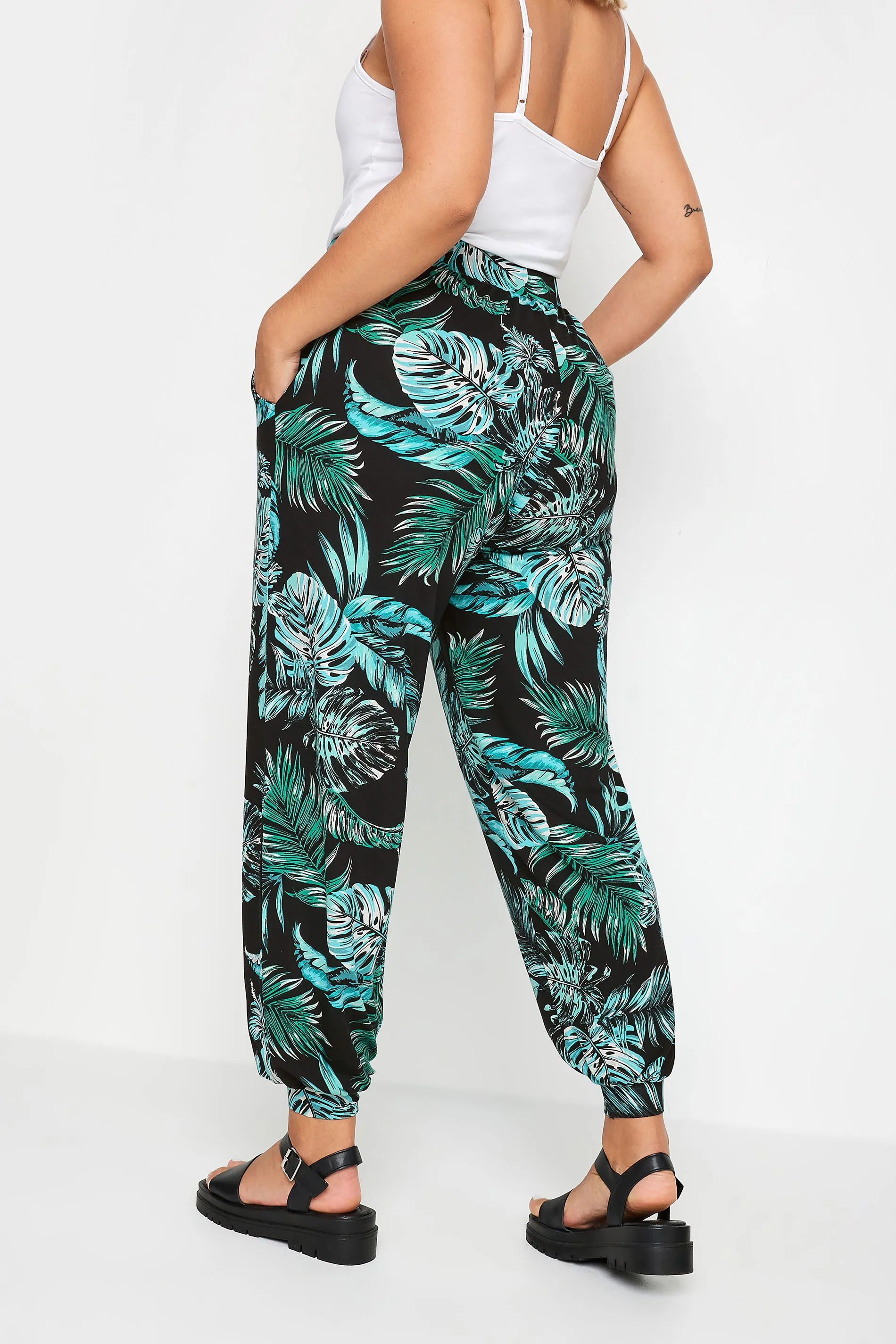 YOURS Curve Black Leaf Print Cuffed Harem Trousers