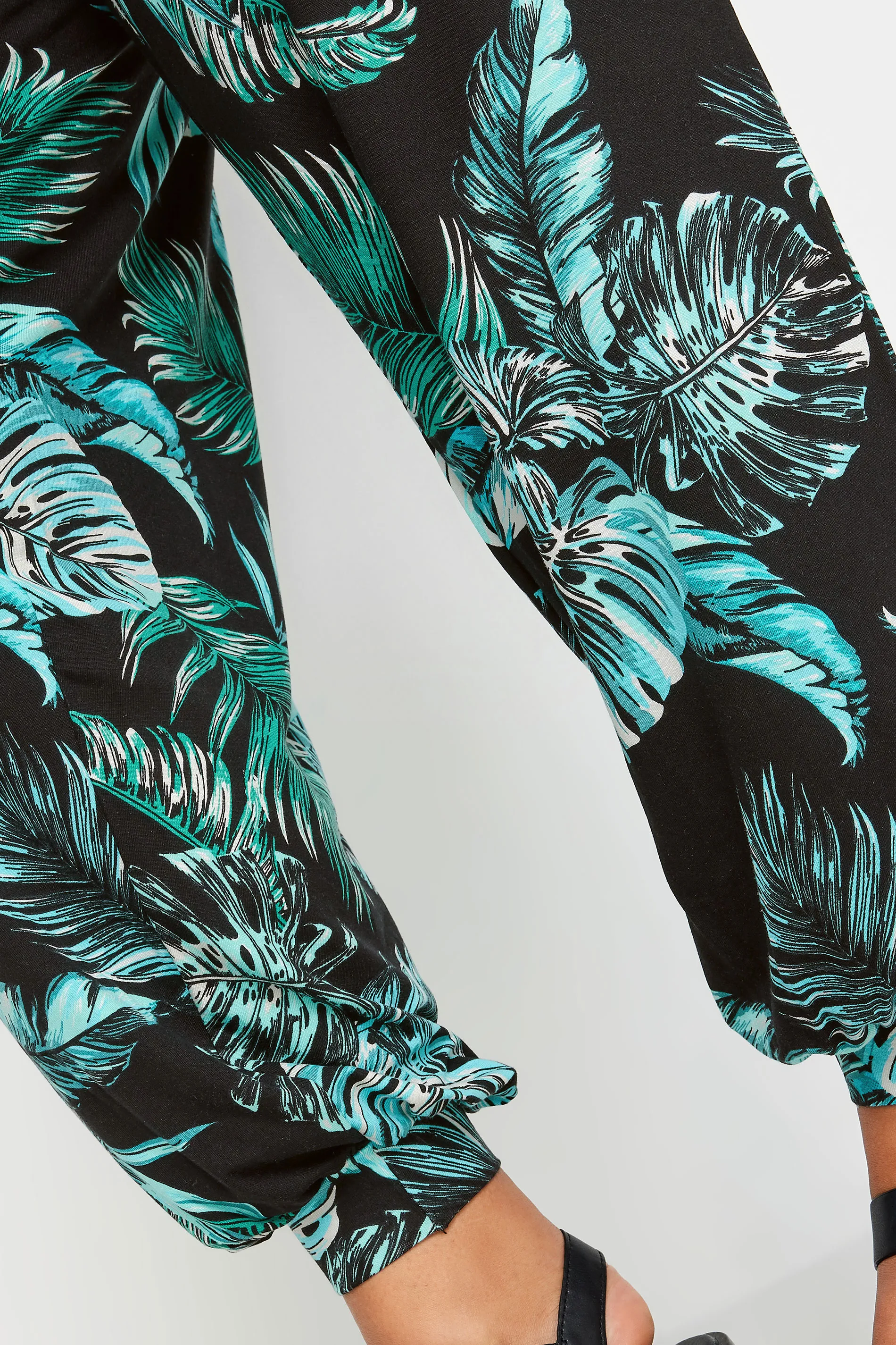 YOURS Curve Black Leaf Print Cuffed Harem Trousers